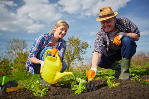 Community gardener working in a public green space in Enfield
